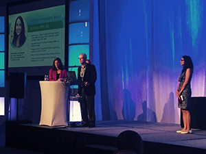 Tara Kiran receiving the 2015 New Investigator Research Award at the North American Primary Care Research Group Annual Meeting in Cancun, Mexico. 