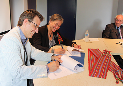 Michael Schull, Margaret Froh and Senator Joseph Poitras